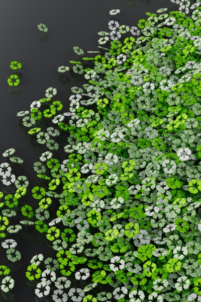 A scattered pile of recycle symbols