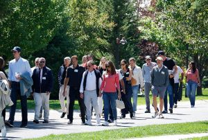 Attendees walk to lunch as they leave a morning session at the Allen & Company Sun Valley Conference on July 10, 2025 in Sun Valley, Idaho.