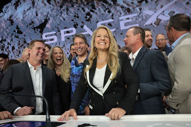 Gwynne Shotwell (C), President of SpaceX, is joined by company leadership as they ring the opening bell at the Nasdaq Marketsite at the launch of the company's initial public offering (IPO) on June 12, 2026 in New York City.